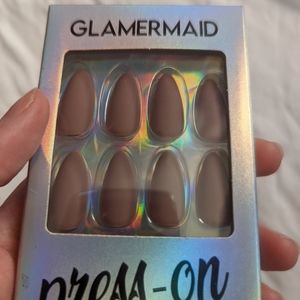 Glamermaid medium length almond press on nails matte taupe.